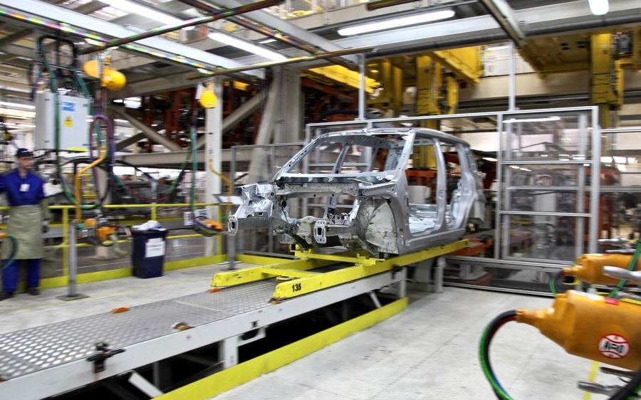 A car body on an assembly line in a factory
